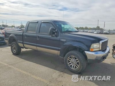 Czwarte zdjęcie samochodu z boku: 2000 FORD F250 SUPER DUTY VIN:1FTNW21S9YEC54241 - miniatura