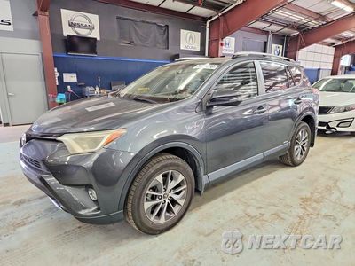 2016 TOYOTA RAV4 HV XLE JTMRJREV5GD005324 - główne zdjęcie licytacji z USA - miniatura