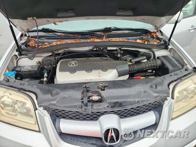Zdjęcie 12 z 13 samochodu: 2006 ACURA MDX TOURING VIN:2HNYD18686H532438 - miniatura