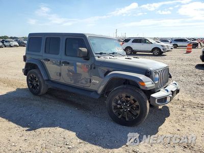 Czwarte zdjęcie samochodu z boku: 2022 JEEP WRANGLER UNLIMITED SAHARA 4XE VIN:1C4JJXP62NW198427 - miniatura