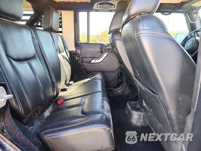 Zdjęcie 11 z 14 samochodu: 2014 JEEP WRANGLER UNLIMITED SAHARA VIN:1C4BJWEG4EL247719 - miniatura