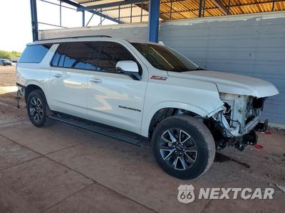Czwarte zdjęcie samochodu z boku: 2021 CHEVROLET SUBURBAN K1500 Z71 VIN:1GNSKDKD4MR221099 - miniatura