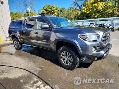 Czwarte zdjęcie samochodu z boku: 2017 TOYOTA TACOMA SR5 V6 VIN:3TMDZ5BN7HM029579 - miniatura