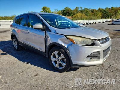 Czwarte zdjęcie samochodu z boku: 2014 FORD ESCAPE SE VIN:1FMCU0GX0EUD63057 - miniatura