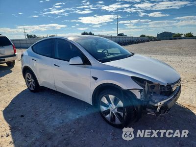 Czwarte zdjęcie samochodu z boku: 2023 TESLA MODEL Y VIN:7SAYGDEE3PA149167 - miniatura