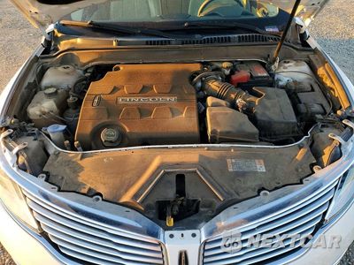 Zdjęcie 11 z 12 samochodu: 2015 LINCOLN MKZ VIN:3LN6L2JK4FR621632 - miniatura