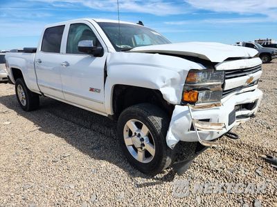 Czwarte zdjęcie samochodu z boku: 2017 CHEVROLET SILVERADO K2500 HEAVY DUTY LTZ VIN:1GC1KWEG0HF113852 - miniatura