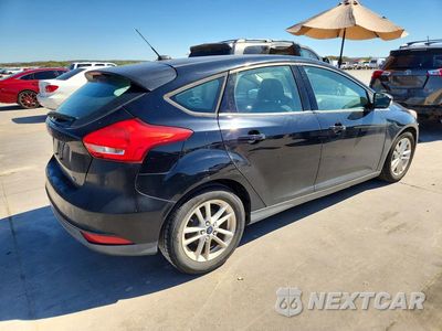 Trzecie zdjęcie samochodu z tyłu: 2017 FORD FOCUS SE VIN:1FADP3K29HL216846 - miniatura