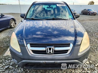 Piąte zdjęcie samochodu w środku: 2004 HONDA CR-V EX VIN:SHSRD78804U244617 - miniatura