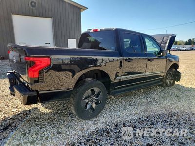 Trzecie zdjęcie samochodu z tyłu: 2024 FORD F150 LIGHTNING XLT VIN:1FTVW3LK4RWG06236 - miniatura