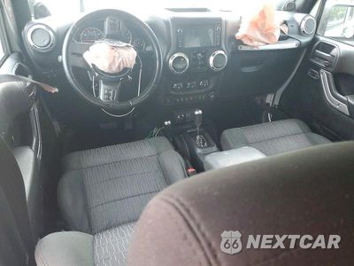 Zdjęcie 8 z 13 samochodu: 2012 JEEP WRANGLER UNLIMITED RUBICON VIN:1C4BJWFGXCL143022 - miniatura