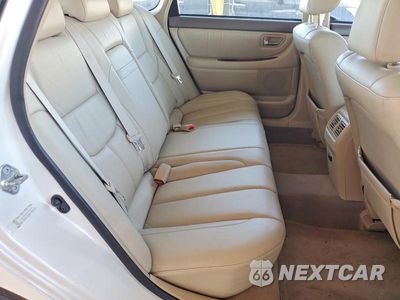 Zdjęcie 10 z 12 samochodu: 2003 TOYOTA AVALON XLS VIN:4T1BF28BX3U312845 - miniatura