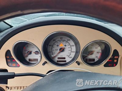 Zdjęcie 9 z 13 samochodu: 2002 MERCEDES-BENZ SLK 320 VIN:WDBKK65F32F266937 - miniatura