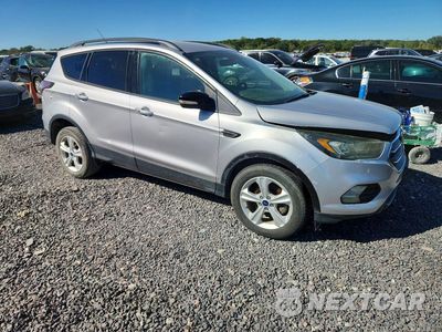 Czwarte zdjęcie samochodu z boku: 2017 FORD ESCAPE TITANIUM VIN:1FMCU0JD2HUA61756 - miniatura
