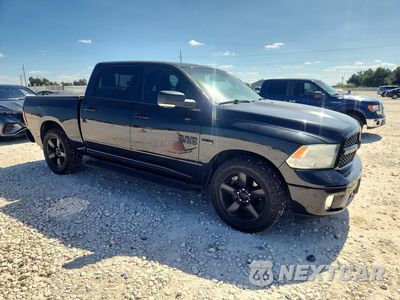 Czwarte zdjęcie samochodu z boku: 2018 RAM 1500 SLT VIN:1C6RR6LT0JS239745 - miniatura
