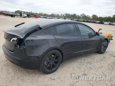 Trzecie zdjęcie samochodu z tyłu: 2023 TESLA MODEL 3 VIN:5YJ3E1EA4PF460120 - miniatura