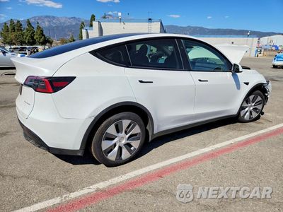 Trzecie zdjęcie samochodu z tyłu: 2024 TESLA MODEL Y VIN:7SAYGDEE6RF083381 - miniatura