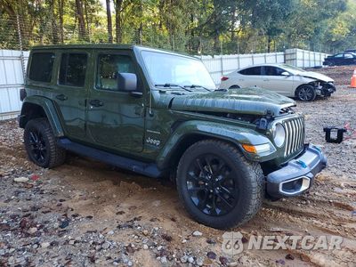 Czwarte zdjęcie samochodu z boku: 2022 JEEP WRANGLER UNLIMITED SAHARA 4XE VIN:1C4JJXP60NW274470 - miniatura