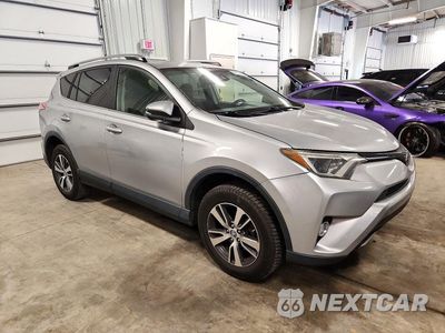 Czwarte zdjęcie samochodu z boku: 2018 TOYOTA RAV4 XLE VIN:JTMRFREV5JJ257195 - miniatura