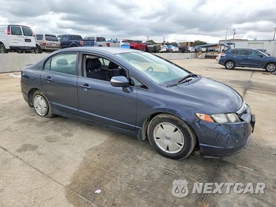 Czwarte zdjęcie samochodu z boku: 2007 HONDA CIVIC HYBRID VIN:JHMFA36207S008727 - miniatura