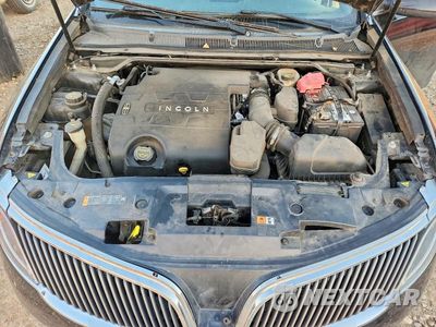 Zdjęcie 11 z 12 samochodu: 2016 LINCOLN MKS VIN:1LNHL9DKXGG601164 - miniatura