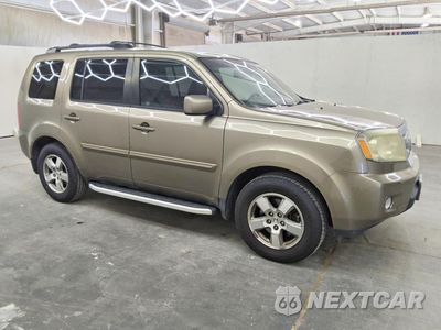 Czwarte zdjęcie samochodu z boku: 2011 HONDA PILOT EXL VIN:5FNYF3H66BB043273 - miniatura