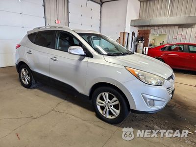 Czwarte zdjęcie samochodu z boku: 2013 HYUNDAI TUCSON GLS VIN:KM8JU3ACXDU756979 - miniatura
