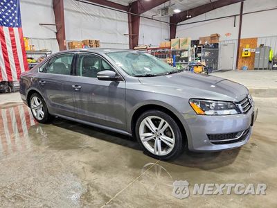 Czwarte zdjęcie samochodu z boku: 2014 VOLKSWAGEN PASSAT SE VIN:1VWBS7A37EC052135 - miniatura