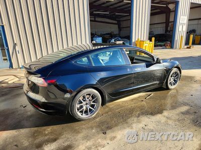 Trzecie zdjęcie samochodu z tyłu: 2022 TESLA MODEL 3 VIN:5YJ3E1EA5NF291271 - miniatura