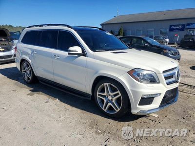 Czwarte zdjęcie samochodu z boku: 2015 MERCEDES-BENZ GL 550 4MATIC VIN:4JGDF7DE0FA577107 - miniatura