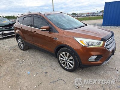 Czwarte zdjęcie samochodu z boku: 2017 FORD ESCAPE TITANIUM VIN:1FMCU9J99HUA47899 - miniatura