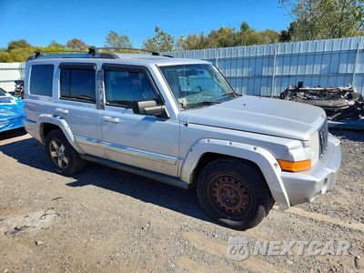 Czwarte zdjęcie samochodu z boku: 2007 JEEP COMMANDER LIMITED VIN:1J8HG58NX7C595582 - miniatura