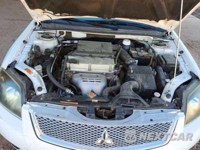 Zdjęcie 11 z 12 samochodu: 2010 MITSUBISHI GALANT FE VIN:4A32B2FF8AE016507 - miniatura