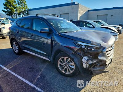 Czwarte zdjęcie samochodu z boku: 2017 HYUNDAI TUCSON SE VIN:KM8J33A49HU593453 - miniatura