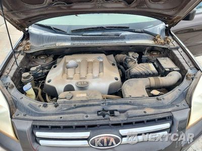 Zdjęcie 12 z 13 samochodu: 2006 KIA SPORTAGE LX VIN:KNDJF724467144680 - miniatura