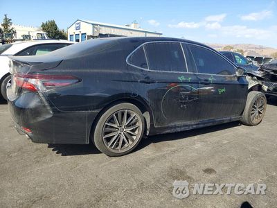 Trzecie zdjęcie samochodu z tyłu: 2024 TOYOTA CAMRY SE VIN:4T1G11AK2RU239116 - miniatura