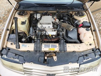 Zdjęcie 11 z 12 samochodu: 1994 CHEVROLET LUMINA VIN:2G1WL54T6R9110517 - miniatura