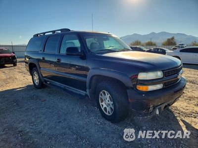 Czwarte zdjęcie samochodu z boku: 2002 CHEVROLET SUBURBAN K1500 VIN:3GNFK16ZX2G287336 - miniatura