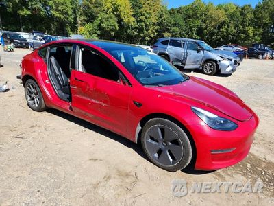 Czwarte zdjęcie samochodu z boku: 2022 TESLA MODEL 3 VIN:5YJ3E1EA1NF188221 - miniatura