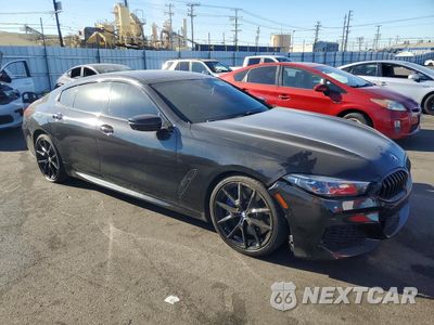 Czwarte zdjęcie samochodu z boku: 2021 BMW M850XI VIN:WBAGV8C00MCF81417 - miniatura