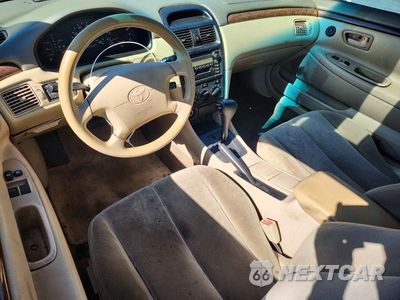 Zdjęcie 8 z 13 samochodu: 2000 TOYOTA CAMRY SOLARA SE VIN:2T1CG22PXYC339994 - miniatura