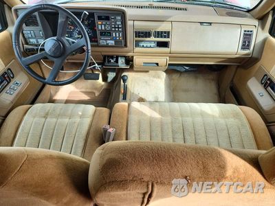 Zdjęcie 8 z 12 samochodu: 1994 GMC SUBURBAN K1500 VIN:1GKFK16K4RJ767882 - miniatura