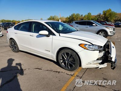 Czwarte zdjęcie samochodu z boku: 2018 FORD FUSION SE HYBRID VIN:3FA6P0LU8JR248914 - miniatura