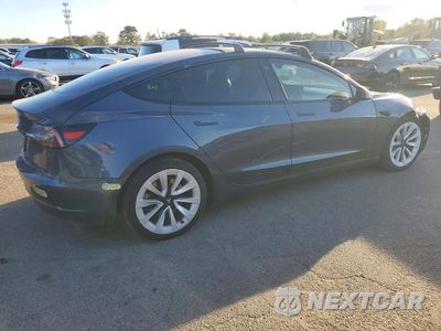 Trzecie zdjęcie samochodu z tyłu: 2023 TESLA MODEL 3 VIN:5YJ3E1EA5PF452009 - miniatura