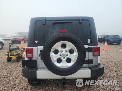 Zdjęcie 6 z 13 samochodu: 2015 JEEP WRANGLER UNLIMITED SAHARA VIN:1C4BJWEG9FL693818 - miniatura