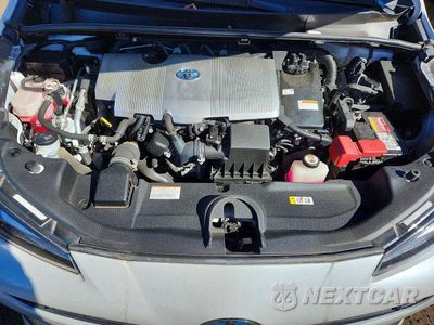Zdjęcie 11 z 12 samochodu: 2021 TOYOTA PRIUS LE AWD-E VIN:JTDL9MFU3M3025211 - miniatura