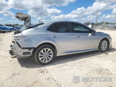 Trzecie zdjęcie samochodu z tyłu: 2021 TOYOTA CAMRY LE VIN:4T1C11AKXMU596051 - miniatura