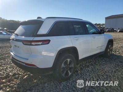 Trzecie zdjęcie samochodu z tyłu: 2024 JEEP GRAND CHEROKEE LIMITED 4XE VIN:1C4RJYB66R8959390 - miniatura