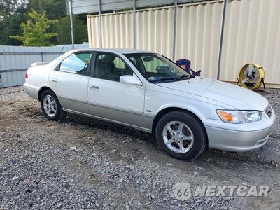 Czwarte zdjęcie samochodu z boku: 2001 TOYOTA CAMRY LE VIN:JT2BG28K110554230 - miniatura
