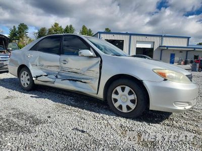 Czwarte zdjęcie samochodu z boku: 2002 TOYOTA CAMRY LE VIN:4T1BE32K42U058050 - miniatura